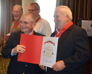 Vince Tedesco presents the Honorable Order of Saint Barbara to Jim Smith at the 2014 reunion